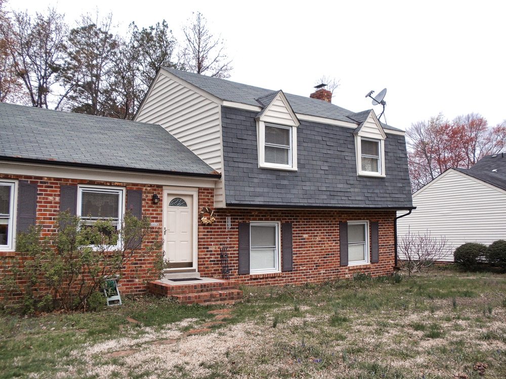 Before and After photos of a siding project on a Gambrel roof in Midlothian. RBM Remodeling
